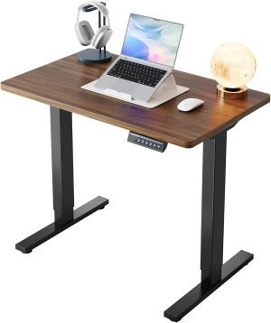 HUANUO 32″ Small Electric Standing Desk Adjustable Height, 4 Memory Height Settings, Sit Stand Up Desk for Home Office & Computer Workstation, Black Walnut