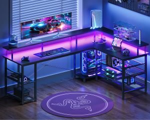 ODK 66″ L Shaped Gaming Desk with Power Outlet and LED Lights, PC Gaming Table with Carbon Fiber Texture, Reversible L Shape Desk with Storage Shelves & Monitor Stand, Home Office Desk, Black